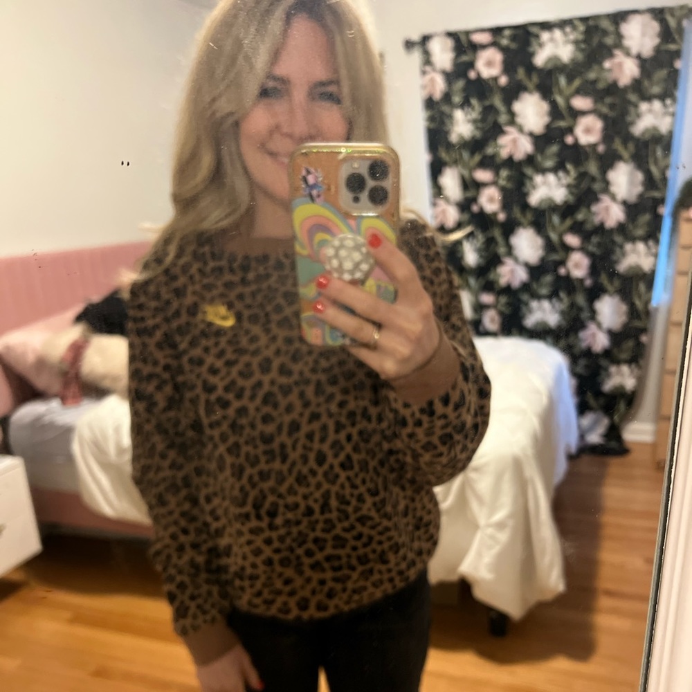Nike size small leopard print pull over sweatshirt